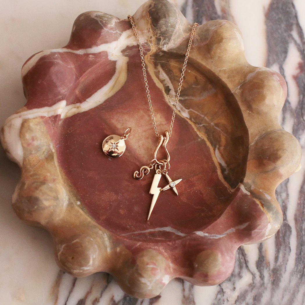 Four Point Star Charm